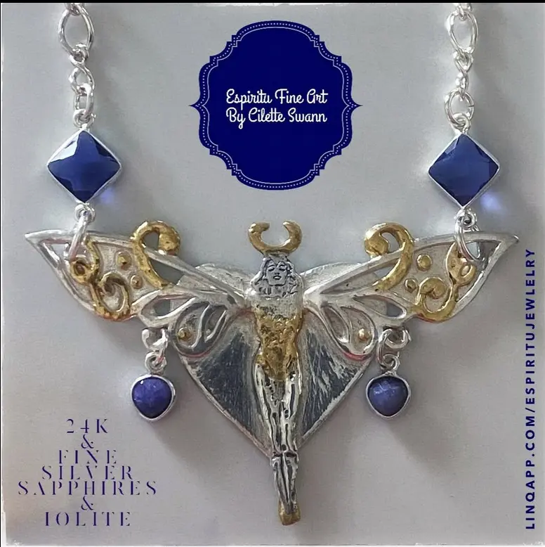 Solid silver pendant with fused 24-karat gold and sapphire dangles