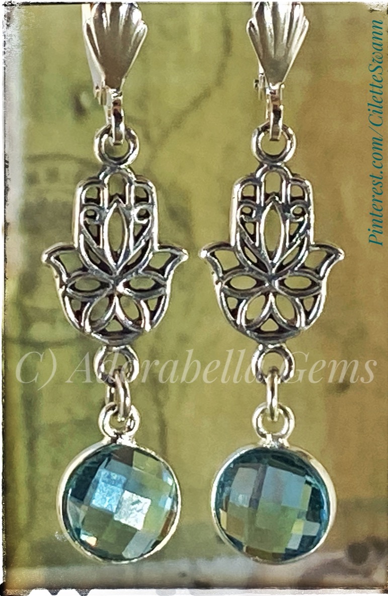 Blue topaz earrings with sterling silver accents